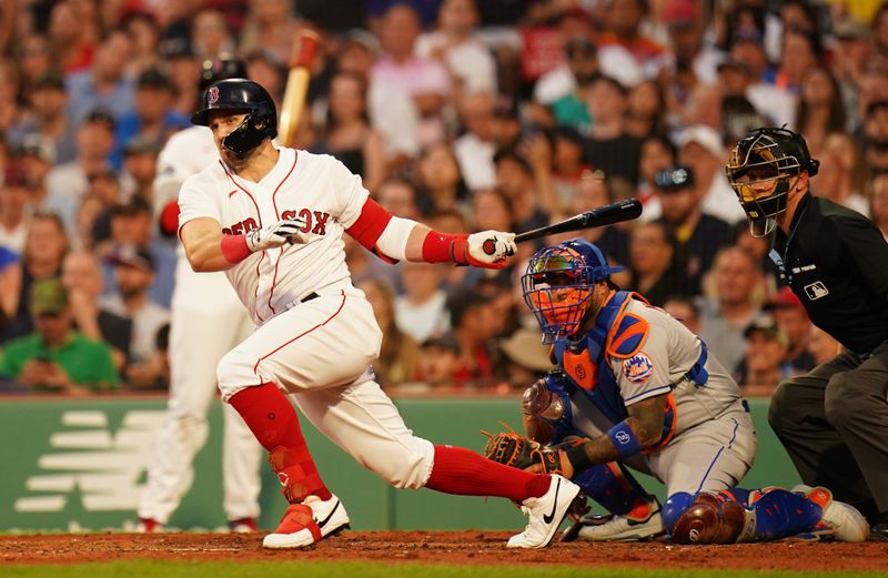 Jul 23, 2023; Boston, Massachusetts, USA; Boston Red Sox center fielder Adam Duvall (18) hits a double to left field to drive in a run against the New York Mets in the third inning at Fenway Park. Mandatory Credit: David Butler II-USA TODAY Sports