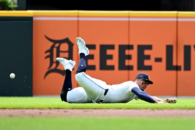 Jul 14, 2024; Detroit, Michigan, USA;  Detroit Tigers right fielder Wenceel Pérez (46) drops a fly ball off the bat of Los Angeles Dodgers catcher Will Smith (16) in the first inning at Comerica Park. Mandatory Credit: Lon Horwedel-USA TODAY Sports