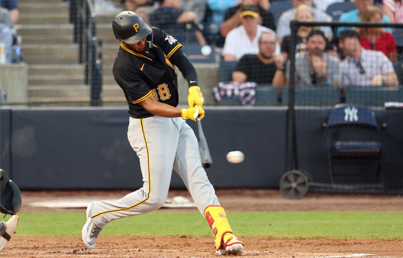 Mar 15, 2024; Tampa, Florida, USA; Pittsburgh Pirates left fielder Edward Olivares (38) hits a double during the fourth inning against the New York Yankees at George M. Steinbrenner Field. Mandatory Credit: Kim Klement Neitzel-USA TODAY Sports