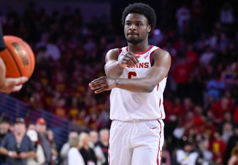 Dec 10, 2023; Los Angeles, California, USA; USC Trojans guard Bronny James (6) waits to shoot a free-throw during the second half against the Long Beach State 49ers at Galen Center. Mandatory Credit: Robert Hanashiro-USA TODAY Sports