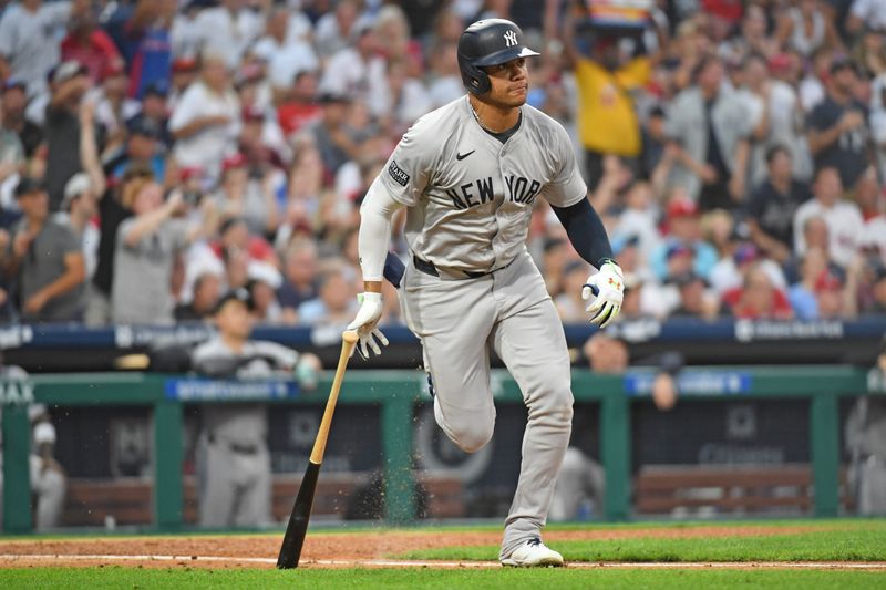 Jul 29, 2024; Philadelphia, Pennsylvania, USA;  New York Yankees outfielder Juan Soto (22) hits a two RBI double against the Philadelphia Phillies during the fifth inning at Citizens Bank Park. Mandatory Credit: Eric Hartline-USA TODAY Sports