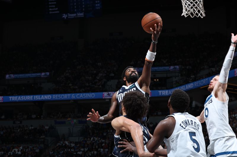 MINNEAPOLIS, MN -  OCTOBER 29: Kyrie Irving #11 of the Dallas Mavericks shoots the ball during the game against the Minnesota Timberwolves on October 29, 2024 at Target Center in Minneapolis, Minnesota. NOTE TO USER: User expressly acknowledges and agrees that, by downloading and or using this Photograph, user is consenting to the terms and conditions of the Getty Images License Agreement. Mandatory Copyright Notice: Copyright 2024 NBAE (Photo by David Sherman/NBAE via Getty Images)