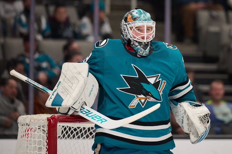 Dec 12, 2023; San Jose, California, USA; San Jose Sharks goaltender Mackenzie Blackwood (29) stands in the goal crease during a stoppage of play against the Winnipeg Jets during the first period at SAP Center at San Jose. Mandatory Credit: Robert Edwards-USA TODAY Sports