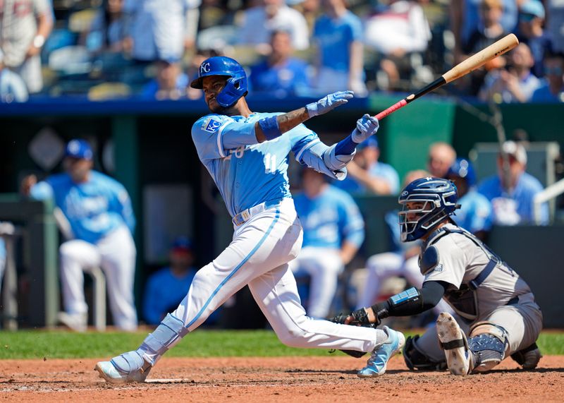 Jun 13, 2024; Kansas City, Missouri, USA; Kansas City Royals third baseman Maikel Garcia (11) hits a walk-off single against the New York Yankees during the ninth inning at Kauffman Stadium. Mandatory Credit: Jay Biggerstaff-USA TODAY Sports