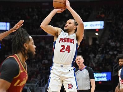 CLEVELAND, OHIO - NOVEMBER 17: Kevin Knox II #24 of the Detroit Pistons shoots over Darius Garland #10 of the Cleveland Cavaliers during the third quarter of an NBA In-Season Tournament game at Rocket Mortgage Fieldhouse on November 17, 2023 in Cleveland, Ohio. The Cavaliers defeated the Pistons 108-100. NOTE TO USER: User expressly acknowledges and agrees that, by downloading and or using this photograph, User is consenting to the terms and conditions of the Getty Images License Agreement. (Photo by Jason Miller/Getty Images)