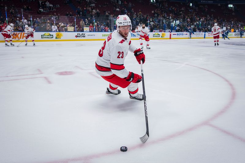 Dec 9, 2023; Vancouver, British Columbia, CAN; Carolina Hurricanes forward Stefan Noesen (23) handles the puck during warm up prior to a game against the Vancouver Canucks at Rogers Arena. Mandatory Credit: Bob Frid-USA TODAY Sports