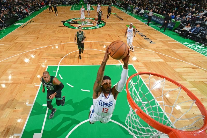 BOSTON, MA - JANUARY 27: Paul George #13 of the LA Clippers drives to the basket during the game against the Boston Celtics on January 27, 2024 at the TD Garden in Boston, Massachusetts. NOTE TO USER: User expressly acknowledges and agrees that, by downloading and or using this photograph, User is consenting to the terms and conditions of the Getty Images License Agreement. Mandatory Copyright Notice: Copyright 2024 NBAE  (Photo by Brian Babineau/NBAE via Getty Images)