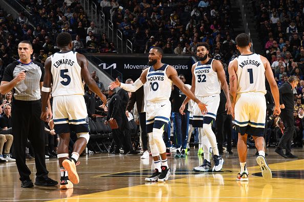 SAN FRANCISCO, CA - NOVEMBER 14: Mike Conley #10 of the Minnesota Timberwolves high fives Anthony Edwards #5 of the Minnesota Timberwolves during the game after the games during the In-Season Tournament on November 14, 2023 at Chase Center in San Francisco, California. NOTE TO USER: User expressly acknowledges and agrees that, by downloading and or using this photograph, user is consenting to the terms and conditions of Getty Images License Agreement. Mandatory Copyright Notice: Copyright 2023 NBAE (Photo by Noah Graham/NBAE via Getty Images)