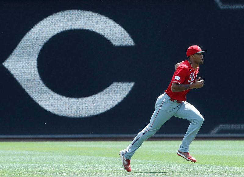 Aug 13, 2023; Pittsburgh, Pennsylvania, USA; Cincinnati Reds right fielder Will Benson (30) warms up in the outfield before the game against the Pittsburgh Pirates at PNC Park. Mandatory Credit: Charles LeClaire-USA TODAY Sports