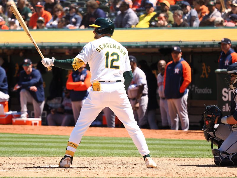 May 25, 2024; Oakland, California, USA; Oakland Athletics shortstop Max Shuemann (12) at bat against the Houston Astros during the sixth inning at Oakland-Alameda County Coliseum. Mandatory Credit: Kelley L Cox-USA TODAY Sports