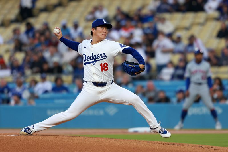 Apr 19, 2024; Los Angeles, California, USA;  Los Angeles Dodgers pitcher Yoshinobu Yamamoto (18) pitches during the first inning against the New York Mets at Dodger Stadium. Mandatory Credit: Kiyoshi Mio-USA TODAY Sports