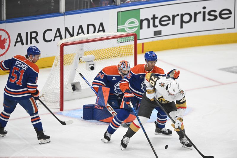 May 12, 2025; Edmonton, Alberta, CAN; Edmonton Oilers goalie Stuart Skinner (74) watches for the puck with defenseman Darnell Nurse (25) and Vegas Golden Knights left winger Tanner Pearson (70) during the first period in game three of the second round of the 2025 Stanley Cup Playoffs at Rogers Place. Mandatory Credit: Walter Tychnowicz-Imagn Images