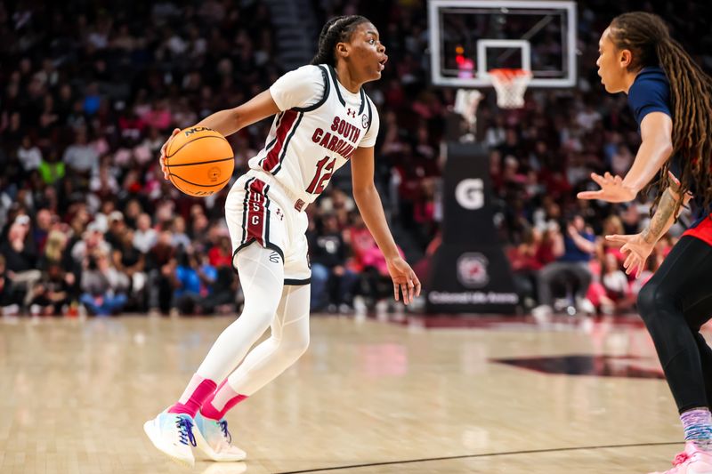 Feb 4, 2024; Columbia, South Carolina, USA; South Carolina Gamecocks guard MiLaysia Fulwiley (12) prepares to drives against the Ole Miss Rebels in the second half at Colonial Life Arena. Mandatory Credit: Jeff Blake-USA TODAY Sports