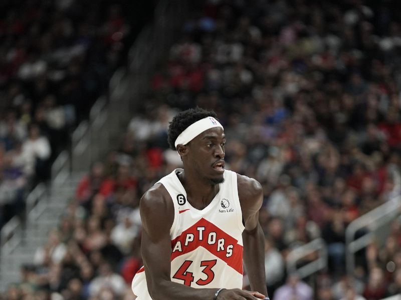 TORONTO, CANADA - OCTOBER 2: Pascal Siakam #43 of the Toronto Raptors handles the ball during the game against the Utah Jazz on October 2, 2022 at the Scotiabank Arena in Toronto, Ontario, Canada.  NOTE TO USER: User expressly acknowledges and agrees that, by downloading and or using this Photograph, user is consenting to the terms and conditions of the Getty Images License Agreement.  Mandatory Copyright Notice: Copyright 2022 NBAE (Photo by Mark Blinch/NBAE via Getty Images)