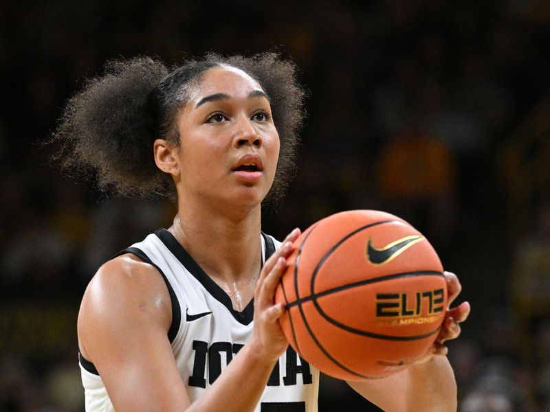 Feb 8, 2024; Iowa City, Iowa, USA; Iowa Hawkeyes forward Hannah Stuelke (45) shoots a free throw against the Penn State Nittany Lions during the second half at Carver-Hawkeye Arena. Mandatory Credit: Jeffrey Becker-USA TODAY Sports