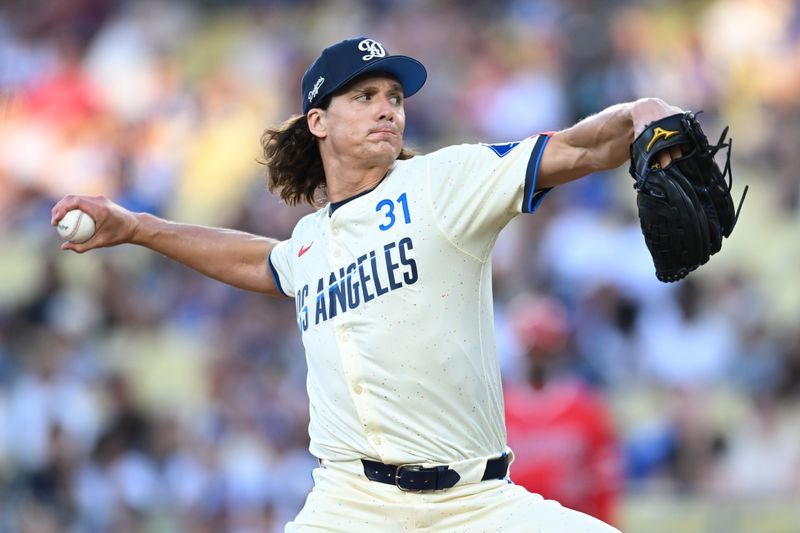 Jun 22, 2024; Los Angeles, California, USA; Los Angeles Dodgers pitcher Tyler Glasnow (31) throws against the Los Angeles Angels during the first inning at Dodger Stadium. Mandatory Credit: Jonathan Hui-USA TODAY Sports