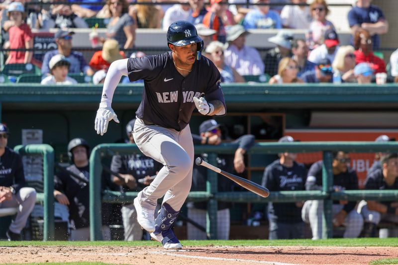 Feb 24, 2024; Lakeland, Florida, USA; New York Yankees center fielder Everson Pereira (80) hits a single during the third inning against the Detroit Tigers at Publix Field at Joker Marchant Stadium. Mandatory Credit: Mike Watters-USA TODAY Sports