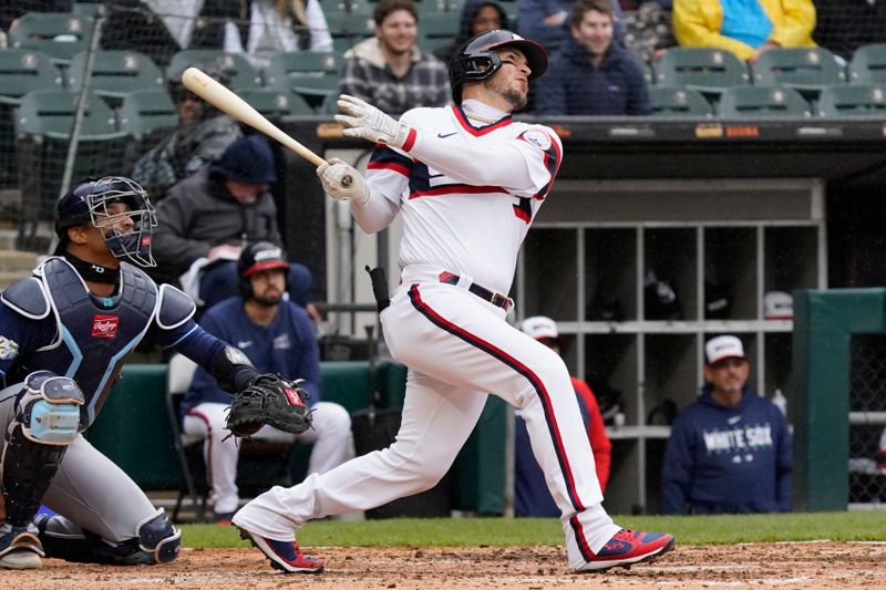 Apr 30, 2023; Chicago, Illinois, USA; Chicago White Sox catcher Yasmani Grandal (24) hits a two-run home run against the Tampa Bay Rays during the sixth inning at Guaranteed Rate Field. Mandatory Credit: David Banks-USA TODAY Sports