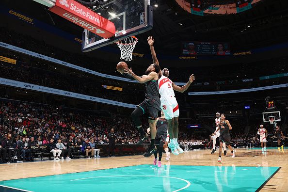 WASHINGTON, DC -? DECEMBER 27: Tyus Jones #5 of the Washington Wizards shoots the ball during the game against the Toronto Raptors on December 27, 2023 at Capital One Arena in Washington, DC. NOTE TO USER: User expressly acknowledges and agrees that, by downloading and or using this Photograph, user is consenting to the terms and conditions of the Getty Images License Agreement. Mandatory Copyright Notice: Copyright 2023 NBAE (Photo by Stephen Gosling/NBAE via Getty Images)