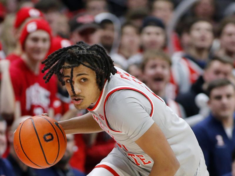 Jan 30, 2024; Columbus, Ohio, USA; Ohio State Buckeyes forward Devin Royal (21) picks up the loose ball during the second half against the Illinois Fighting Illini at Value City Arena. Mandatory Credit: Joseph Maiorana-USA TODAY Sports