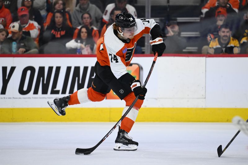 Nov 2, 2024; Philadelphia, Pennsylvania, USA; Philadelphia Flyers right wing Owen Tippett (74) shoots the puck against the Boston Bruins in the second period at Wells Fargo Center. Mandatory Credit: Kyle Ross-Imagn Images