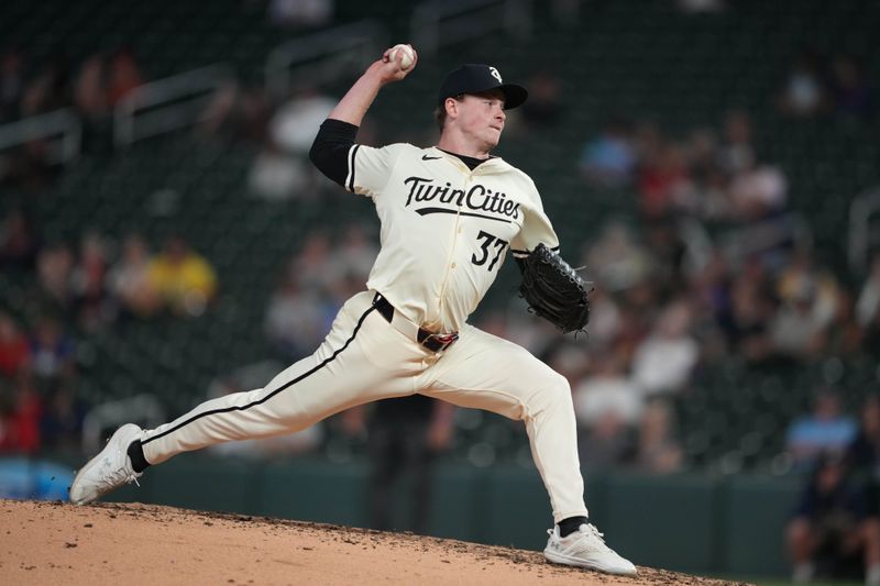 Sep 10, 2024; Minneapolis, Minnesota, USA; Minnesota Twins relief pitcher Louie Varland (37) delivers a pitch during the ninth inning against the Los Angeles Angels at Target Field. Mandatory Credit: Jordan Johnson-Imagn Images