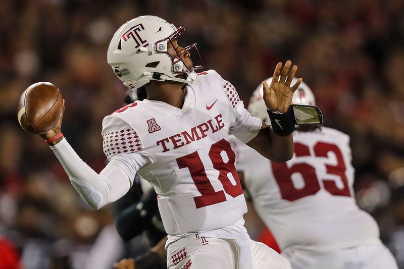 Oct 8, 2021; Cincinnati, Ohio, USA; Temple Owls quarterback D'Wan Mathis (18) throws a pass against the Cincinnati Bearcats in the first half at Nippert Stadium. Mandatory Credit: Katie Stratman-USA TODAY Sports