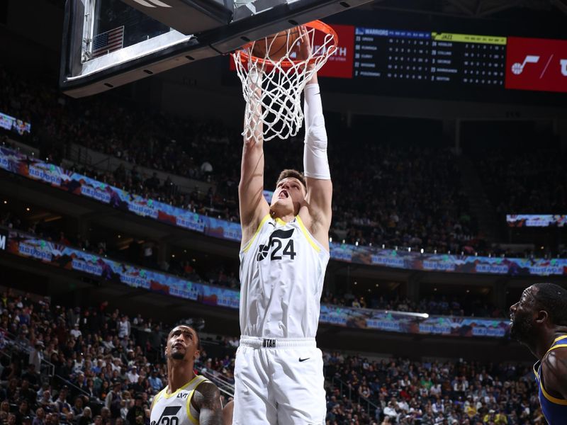 SALT LAKE CITY, UT - FEBRUARY 15: Walker Kessler #24 of the Utah Jazz dunks the ball during the game against the Golden State Warriors on February 15, 2024 at Delta Center in Salt Lake City, Utah. NOTE TO USER: User expressly acknowledges and agrees that, by downloading and or using this Photograph, User is consenting to the terms and conditions of the Getty Images License Agreement. Mandatory Copyright Notice: Copyright 2024 NBAE (Photo by Melissa Majchrzak/NBAE via Getty Images)