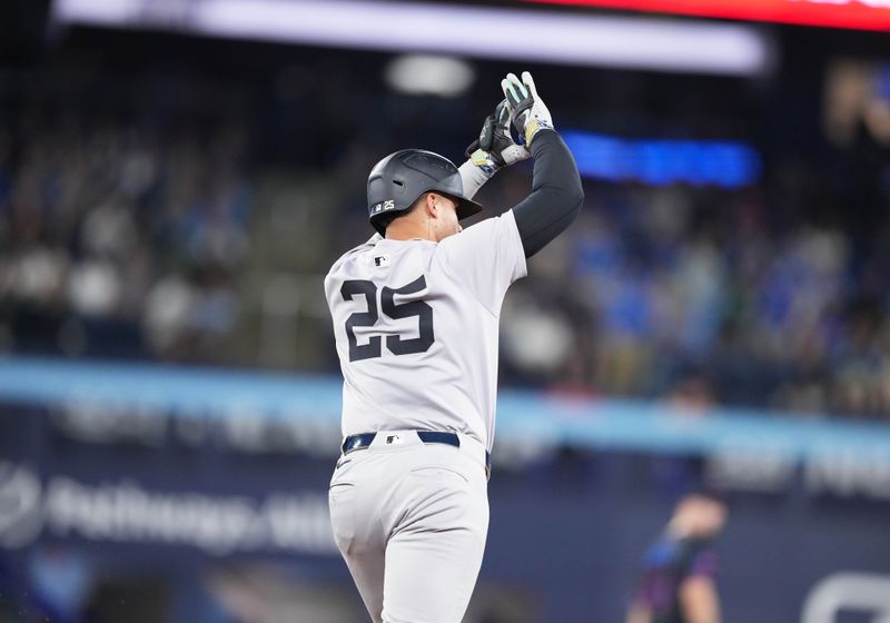 Jun 28, 2024; Toronto, Ontario, CAN; New York Yankees second base Gleyber Torres (25) celebrates while running the bases after hitting a home run against the Toronto Blue Jays during the sixth inning at Rogers Centre. Mandatory Credit: Nick Turchiaro-USA TODAY Sports