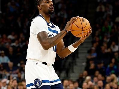 MINNEAPOLIS, MINNESOTA - NOVEMBER 01: Naz Reid #11 of the Minnesota Timberwolves shoots the ball against the Denver Nuggets in the first quarter at Target Center on November 01, 2023 in Minneapolis, Minnesota. The Timberwolves defeated the Nuggets 110-89. NOTE TO USER: User expressly acknowledges and agrees that, by downloading and or using this photograph, User is consenting to the terms and conditions of the Getty Images License Agreement. (Photo by David Berding/Getty Images)