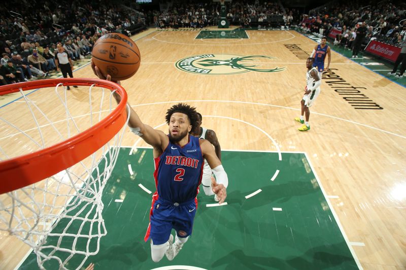 MILWAUKEE, WI - NOVEMBER 13: Cade Cunningham #2 of the Detroit Pistons drives to the basket during the game against the Milwaukee Bucks on November 13, 2024 at the Fiserv Forum Center in Milwaukee, Wisconsin. NOTE TO USER: User expressly acknowledges and agrees that, by downloading and or using this Photograph, user is consenting to the terms and conditions of the Getty Images License Agreement. Mandatory Copyright Notice: Copyright 2024 NBAE (Photo by Gary Dineen/NBAE via Getty Images).