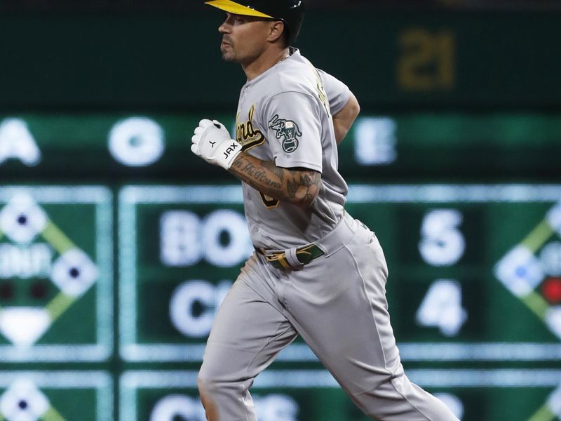 Jun 6, 2023; Pittsburgh, Pennsylvania, USA; Oakland Athletics second baseman Jace Peterson (6) runs the bases after hitting his second two run home run of the game against the Pittsburgh Pirates during the ninth inning at PNC Park. Oakland won 11-2. Mandatory Credit: Charles LeClaire-USA TODAY Sports