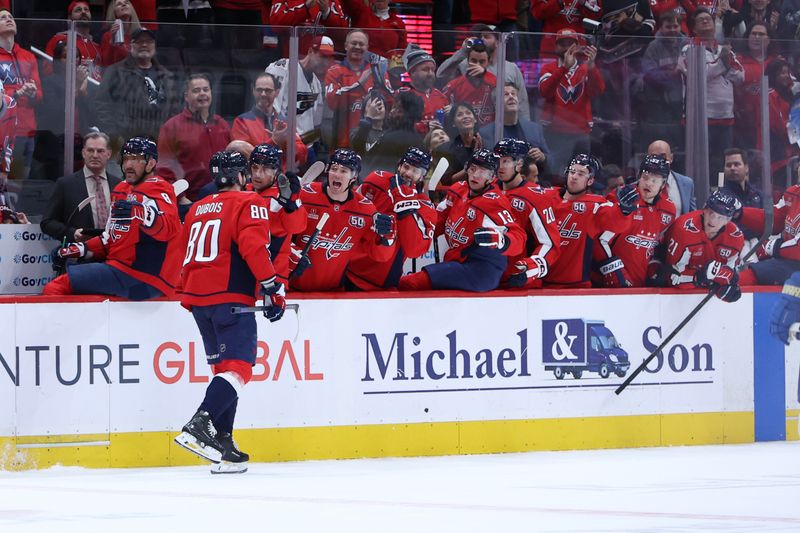 Feb 27, 2025; Washington, District of Columbia, USA; Washington Capitals left wing Pierre-Luc Dubois (80) celebrates with teammates after scoring a goal against the St. Louis Blues in the first period at Capital One Arena. Mandatory Credit: Geoff Burke-Imagn Images