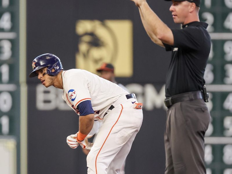 Jun 23, 2024; Houston, Texas, USA; Houston Astros shortstop Jeremy Pena (3) reacts to a two RBI double against then Baltimore Orioles in the sixth inning at Minute Maid Park. Mandatory Credit: Thomas Shea-USA TODAY Sports