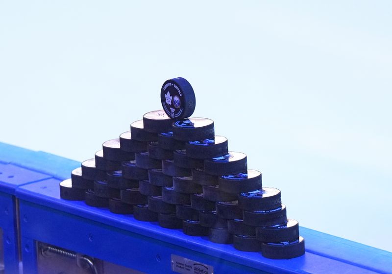 Mar 6, 2024; Toronto, Ontario, CAN; The pucks sit on the boards prior to the start of warmup before a game between the Toronto Maple Leafs and the Buffalo Sabres at Scotiabank Arena. Mandatory Credit: Nick Turchiaro-USA TODAY Sports