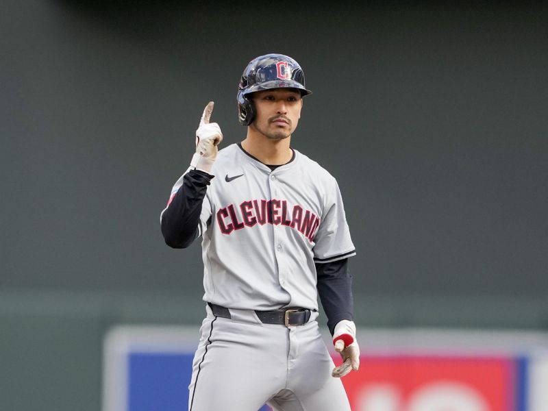 Apr 4, 2024; Minneapolis, Minnesota, USA; Cleveland Guardians left fielder Steven Kwan (38)  reacts to hitting a double during the fifth inning against the Minnesota Twins at Target Field. Mandatory Credit: Jordan Johnson-USA TODAY Sports