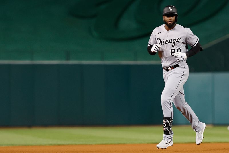 Sep 19, 2023; Washington, District of Columbia, USA; Chicago White Sox center fielder Luis Robert Jr. (88) rounds the bases after hitting a home run against the Washington Nationals during the fourth inning at Nationals Park. Mandatory Credit: Geoff Burke-USA TODAY Sports