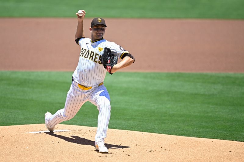 Jun 12, 2024; San Diego, California, USA; San Diego Padres starting pitcher Michael King (34) pitches against the Oakland Athletics during the first inning at Petco Park. Mandatory Credit: Orlando Ramirez-USA TODAY Sports