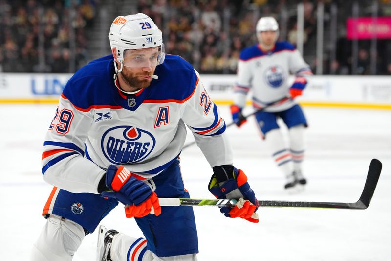 Dec 3, 2024; Las Vegas, Nevada, USA; Edmonton Oilers center Leon Draisaitl (29) skates against the Vegas Golden Knights during the first period at T-Mobile Arena. Mandatory Credit: Stephen R. Sylvanie-Imagn Images