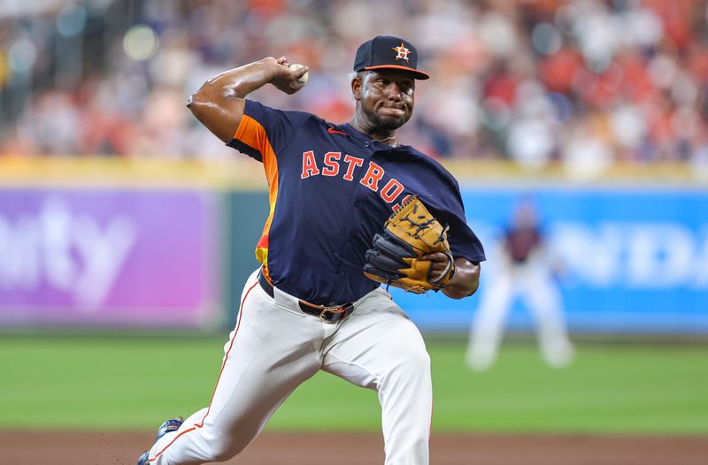 Jul 14, 2024; Houston, Texas, USA; Houston Astros starting pitcher Ronel Blanco (56) delivers a pitch during the second inning against the Texas Rangers at Minute Maid Park. Mandatory Credit: Troy Taormina-USA TODAY Sports