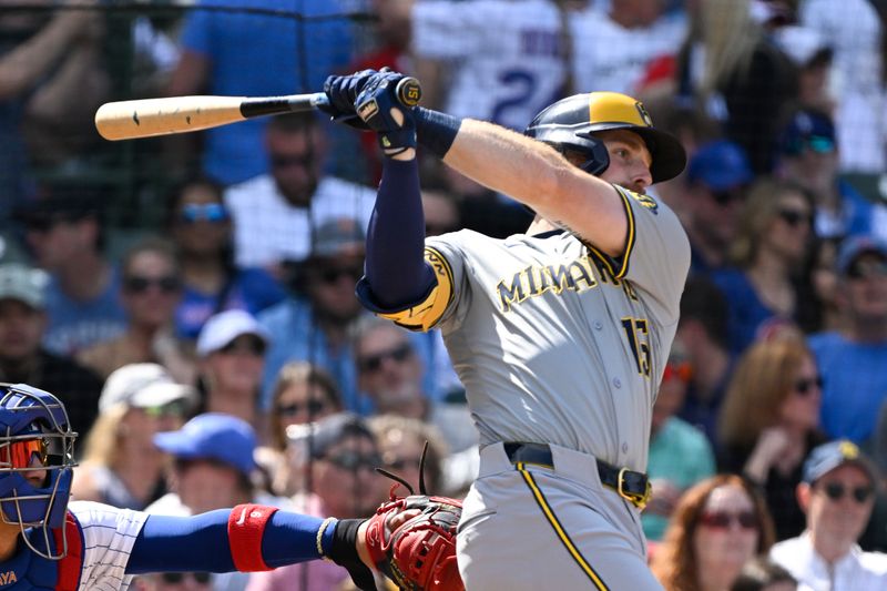 May 4, 2024; Chicago, Illinois, USA;  Milwaukee Brewers third base Oliver Dunn (15) hits an RBI triple against the Chicago Cubs during the seventh inning at Wrigley Field. Mandatory Credit: Matt Marton-USA TODAY Sports