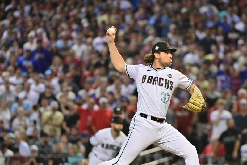 Nov 1, 2023; Phoenix, AZ, USA; Arizona Diamondbacks relief pitcher Kevin Ginkel (37) pitches in the seventh inning against the Texas Rangers in game five of the 2023 World Series at Chase Field. Mandatory Credit: Matt Kartozian-USA TODAY Sports