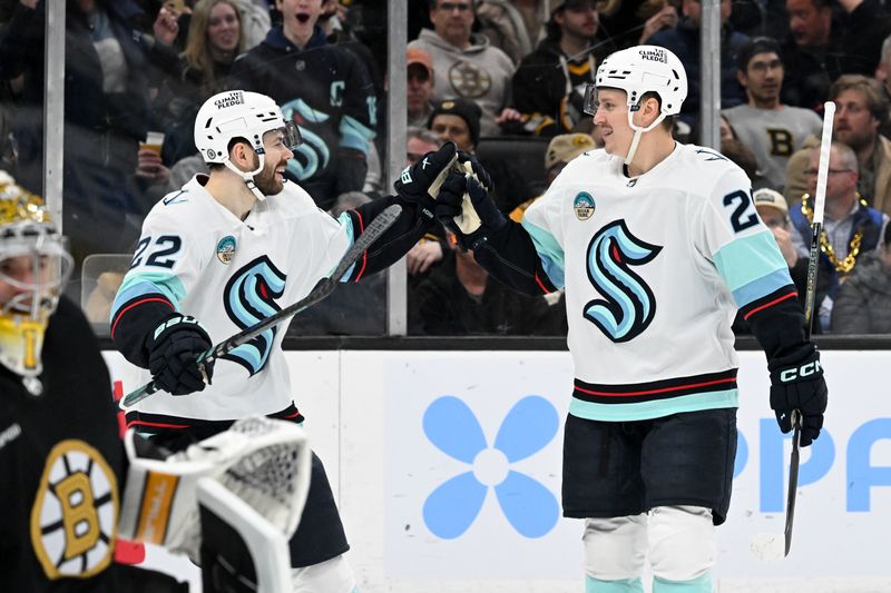 Feb 15, 2024; Boston, Massachusetts, USA; Seattle Kraken right wing Eeli Tolvanen (20) celebrates with right wing Oliver Bjorkstrand (22) after scoring a goal against the Boston Bruins during the second period at the TD Garden. Mandatory Credit: Brian Fluharty-USA TODAY Sports