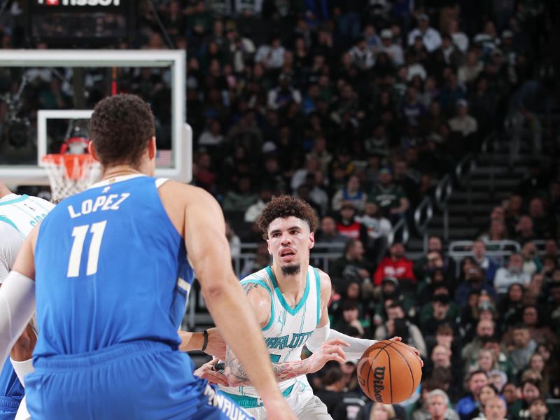 MILWAUKEE, WI - NOVEMBER 23: LaMelo Ball #1 of the Charlotte Hornets dribbles the ball during the game against the Milwaukee Bucks on November 23, 2024 at the Fiserv Forum Center in Milwaukee, Wisconsin. NOTE TO USER: User expressly acknowledges and agrees that, by downloading and or using this Photograph, user is consenting to the terms and conditions of the Getty Images License Agreement. Mandatory Copyright Notice: Copyright 2024 NBAE (Photo by Gary Dineen/NBAE via Getty Images).