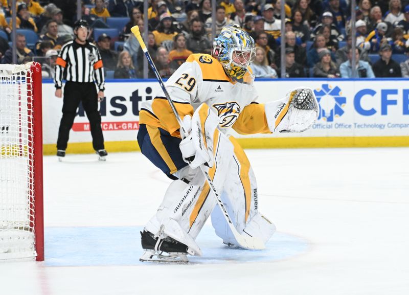 Jan 31, 2025; Buffalo, New York, USA; Nashville Predators goaltender Justus Annunen (29) defends the net against the Buffalo Sabres in the second period at the KeyBank Center. Mandatory Credit: Mark Konezny-Imagn Images