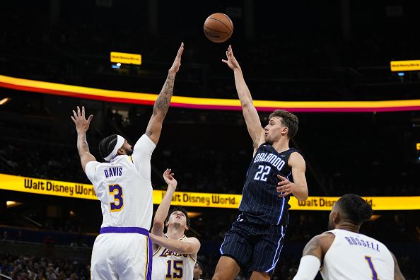 ORLANDO, FLORIDA - NOVEMBER 04: Franz Wagner #22 of the Orlando Magic shoots over Anthony Davis #3 of the Los Angeles Lakers during the second half at Amway Center on November 04, 2023 in Orlando, Florida. NOTE TO USER: User expressly acknowledges and agrees that, by downloading and or using this photograph, User is consenting to the terms and conditions of the Getty Images License Agreement. (Photo by Rich Storry/Getty Images)