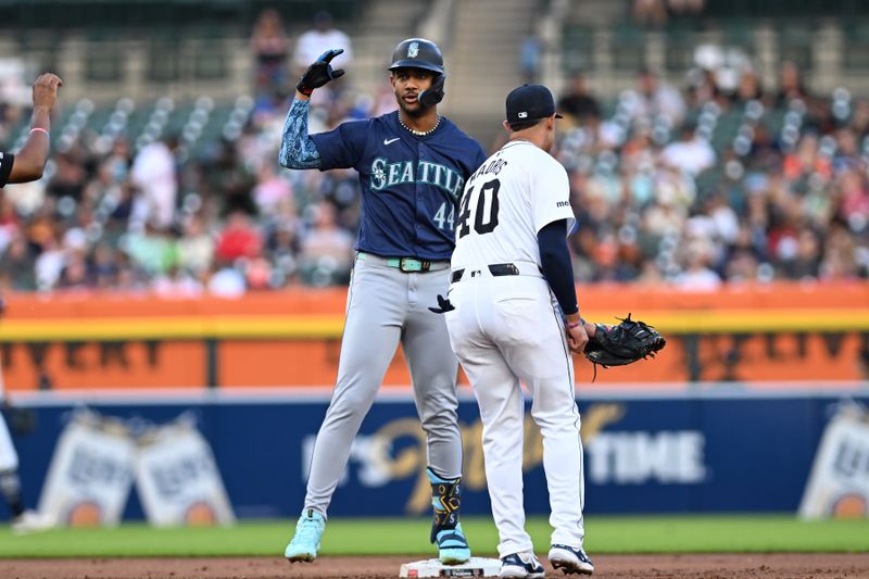 Aug 13, 2024; Detroit, Michigan, USA;  Seattle Mariners designated hitter Julio Rodriguez (44) celebrates at second base after hitting a double against the Detroit Tigers in the second inning at Comerica Park. Mandatory Credit: Lon Horwedel-USA TODAY Sports