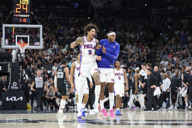 SAN ANTONIO, TX - APRIL 7: Kelly Oubre Jr. #9 and Buddy Heild #17 of the Philadelphia 76ers celebrate during the game against the San Antonio Spurs on April 7, 2024 at the Frost Bank Center in San Antonio, Texas. NOTE TO USER: User expressly acknowledges and agrees that, by downloading and or using this photograph, user is consenting to the terms and conditions of the Getty Images License Agreement. Mandatory Copyright Notice: Copyright 2024 NBAE (Photos by Tim Heitman/NBAE via Getty Images)