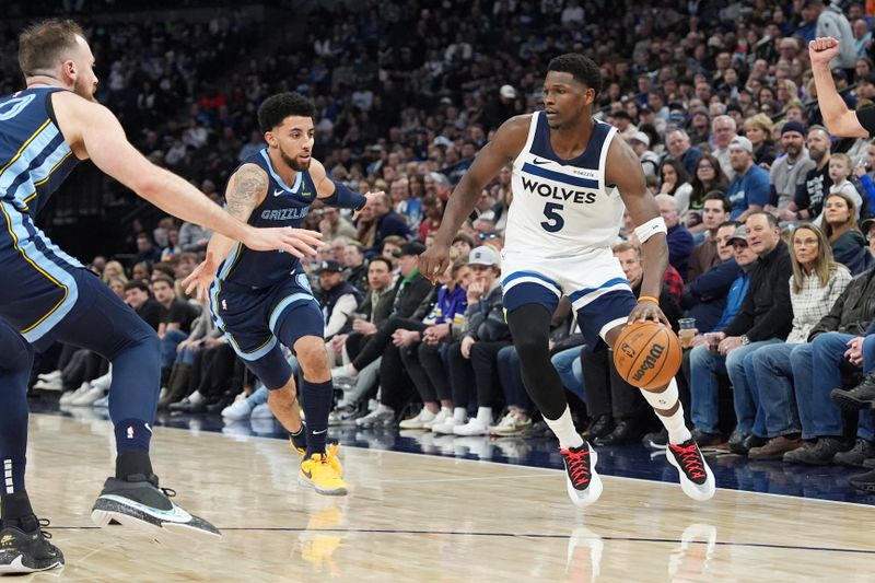 MINNEAPOLIS, MN -  JANUARY 11: Anthony Edwards #5 of the Minnesota Timberwolves dribbles the ball during the game against the Memphis Grizzlies on January 11, 2025 at Target Center in Minneapolis, Minnesota. NOTE TO USER: User expressly acknowledges and agrees that, by downloading and or using this Photograph, user is consenting to the terms and conditions of the Getty Images License Agreement. Mandatory Copyright Notice: Copyright 2025 NBAE (Photo by Jordan Johnson/NBAE via Getty Images)