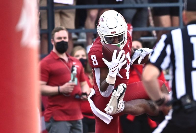 Sep 11, 2021; Pullman, Washington, USA; Washington State Cougars wide receiver Calvin Jackson Jr. (8) makes a catch for a touchdown against the Portland State Vikings in the first half at Gesa Field at Martin Stadium. Mandatory Credit: James Snook-USA TODAY Sports